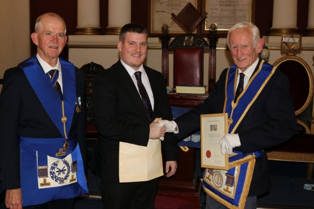 Senior member of the lodge welcoming our newest member